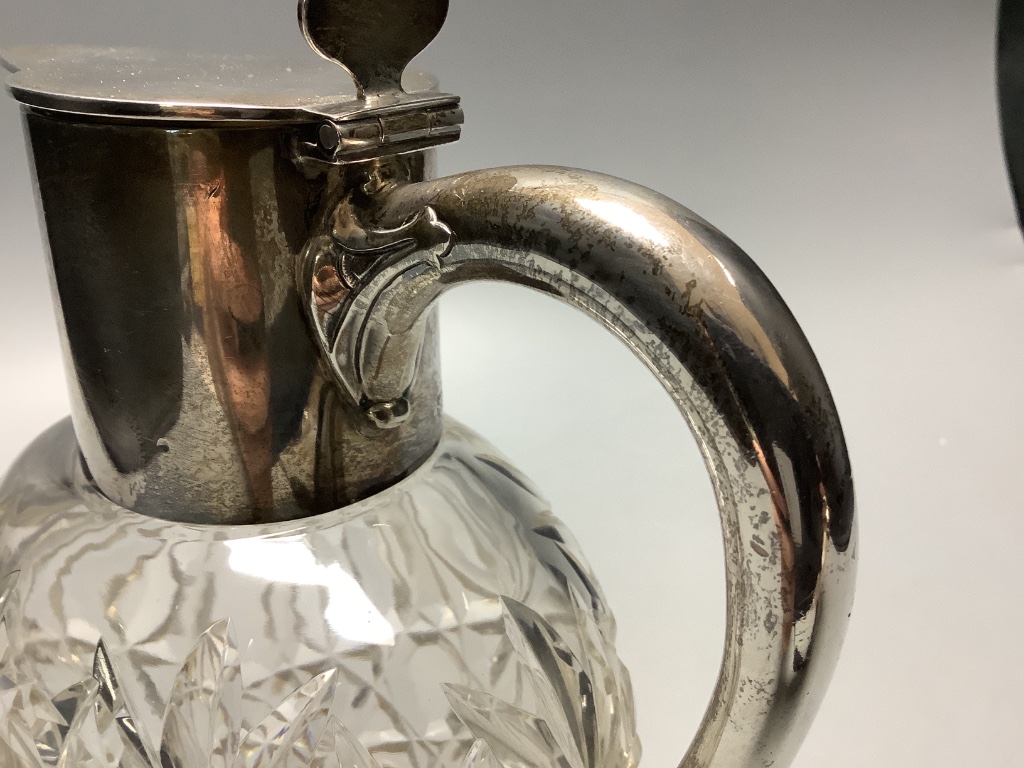 An Edwardian silver mounted cut class claret jug by Hamilton and Inches, Edinburgh 1902, height, 21.6 cm.